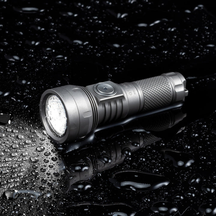 Lumintop GT Nano 3.0 mini torch in titanium, sandblasted finish with retro appeal, IPX-8 waterproof for harsh environments.